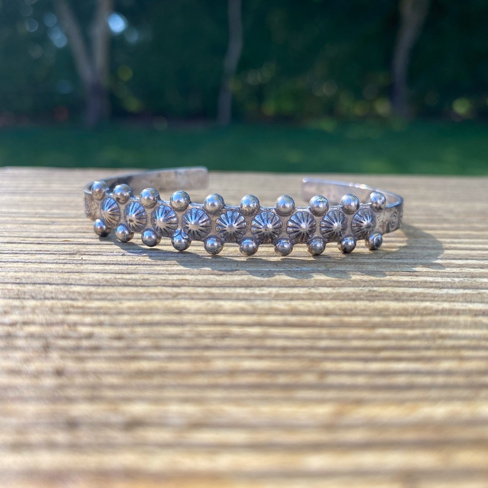 Vintage silver ball and flower like design on cuff bracelet